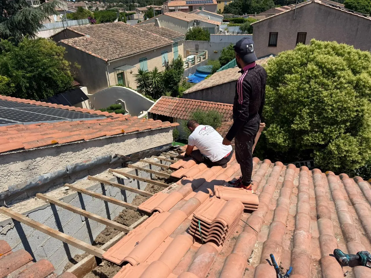 Réfection de couverture : dépose des tuiles
